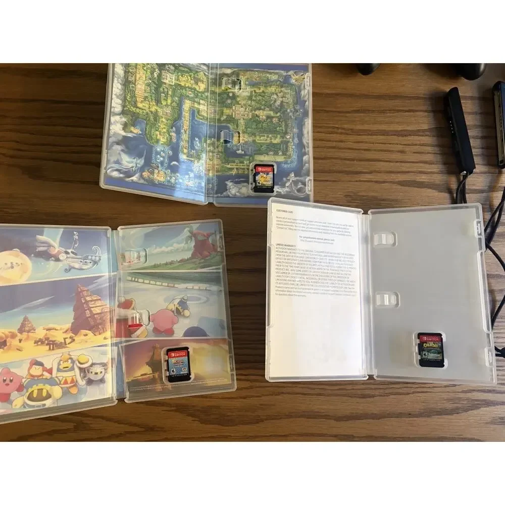 Nintendo Switch Console Gray Bundle with Games Kirby Pikachu Crash and Case